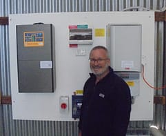 Paul Gilders with the battery and solar inverters